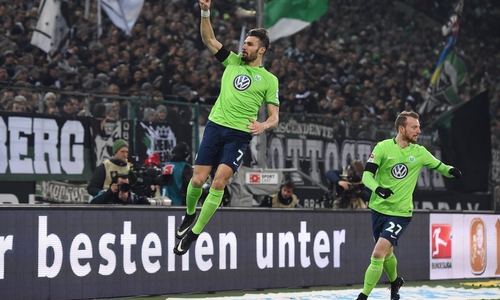 Daniel Caligiuri und Maximilian Arnold bejubeln das 1:0. Foto: Imago/Revierfoto