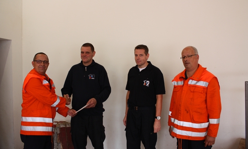 Von links: Stadtbrandmeister Christian Hellmeier, Löschmeister Norbert Bothe, Hauptbrandmeister Ullrich Kohl und Goslars Ortsbrandmeister Olaf Laue. Foto: Feuerwehr Goslar