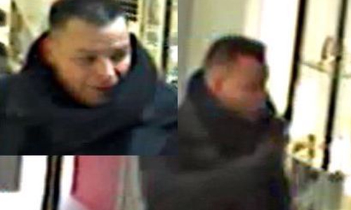 Das Bild zeigt den Unbekannten beim Betreten des Geschäfts. Außer der Tasche hält er eine Plastiktüte in der Hand, aus der er die Buttersäure versprüht hat. Foto: Polizei
