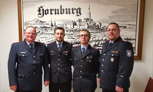 Ortsbrandmeister Wolfgang Hesse, neuer Jugendwart Marvin Fricke, ehemaliger Jugendwart Bernhard Wölfer,  stellv. Ortsbrandmeister Thilo Linke. Foto: Luisa Schneemilch