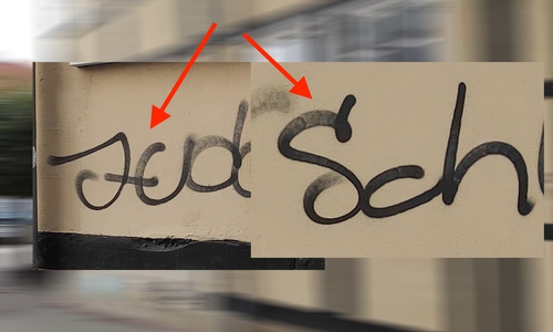 Die Schriftart der Hassbotschaft weist markante Züge auf.