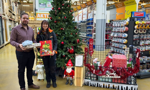 Sebastian Günther, Leiter Ambulante Jugendhilfe beim Caritasverband Braunschweig und die stellvertretende Marktleiterin Frau Gasparini.