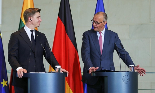 Mindaugas Sinkevicius und Friedrich Merz am 05.10.2026