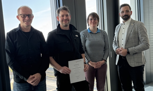 Von rechts: Christian Malak, Obermeister der Schornsteinfegerinnung Braunschweig, Umweltdezernentin Anna Katharina Hanusch, Bezirksschornsteinfeger Marcel Schindler und der Stellenleiter für den Bereich Schornsteinfegerwesen im Fachbereich Umwelt Thomas Schulze.