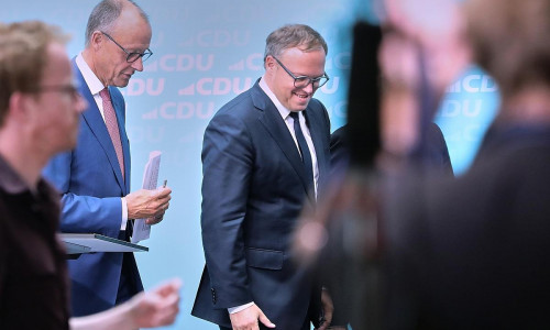 Friedrich Merz und Mario Voigt (Archiv)