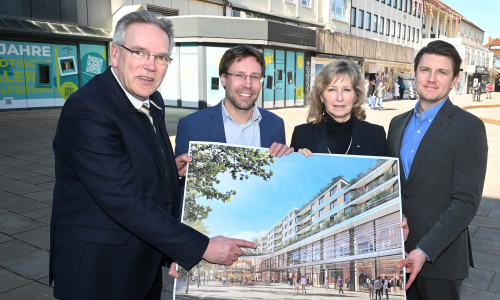 Ulf Müller (BRAWO RE Building Solutions GmbH), Sebastian Geese (Bereichsleiter Hochbau des Bauunternehmens Köster), Claudia Kayser (Leiterin der Direktion Wolfsburg der Volksbank BRAWO) und Ivan Binder (Projektleiter, BRAWO RE Development Braunschweig GmbH) freuen sich auf die Zusammenarbeit für den Bau der BRAWO Arkaden (v. li.).