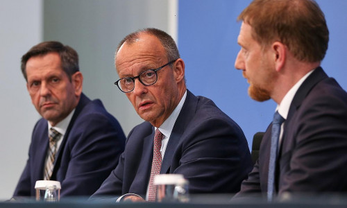 Olaf Lies, Friedrich Merz und Michael Kretschmer am 18.06.2025