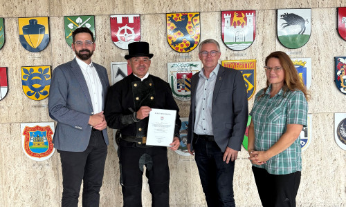 v.l.n.r.: Christian Malak, Obermeister der Schornsteinfegerinnung Braunschweig, Bezirksschornsteinfegermeister Andreas Krause, Stadtrat Andreas Bauer und Anja Huttner, Leiterin des Ordnungsamtes.