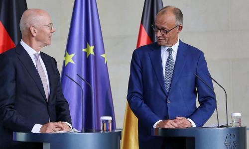 Martin Blessing und Friedrich Merz am 22.09.2025