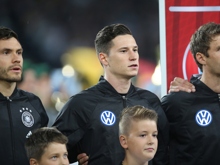 VW ab 2019 neuer Generalsponsor der "Mannschaft" wie hier in unserer Fotomontage? Foto: Agentur Hübner