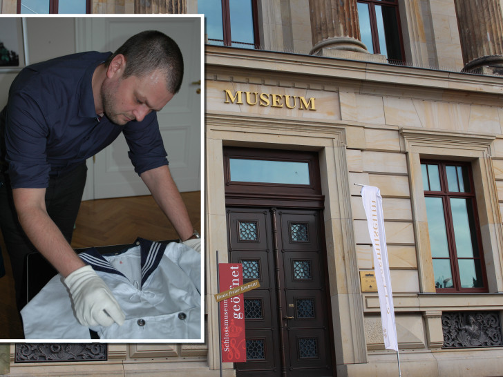 Ein wissenschaftlicher Mitarbeiter begutachtet den Anzug. Foto: Schlossmuseum/Nick Wenkel