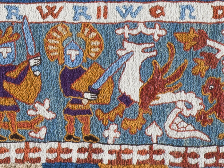 Detail aus dem Herzog Ernst-Teppich: Kampf mit dem Drachen und Errettung des Löwen. Foto: Städtisches Museum Braunschweig/Dirk Scherer