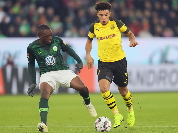 Zum ersten Geisterspiel empfängt der VfL Wolfsburg geich mal Jadon Sancho (re.) und den BVB.