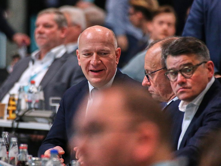 Kai Wegner, Friedrich Merz, Boris Rhein (Archiv)