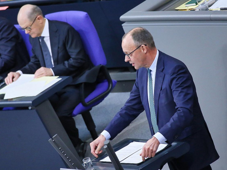 Olaf Scholz und Friedrich Merz am 11.02.2025