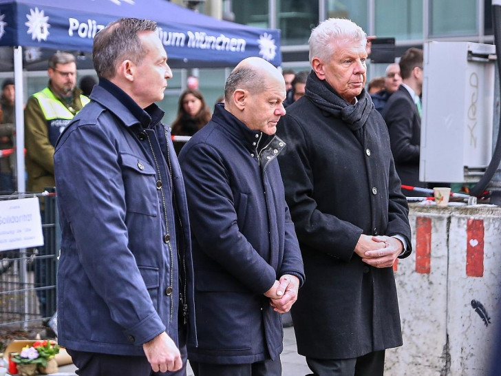 Wissing, Scholz und Reiter am Anschlagsort in München