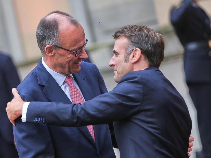 Friedrich Merz und Emmanuel Macron (Archiv)