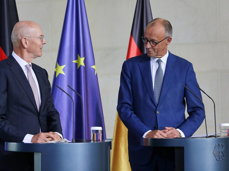 Martin Blessing und Friedrich Merz am 22.09.2025