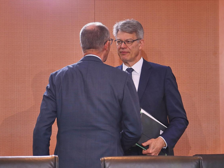 Friedrich Merz und Patrick Schnieder (Archiv)